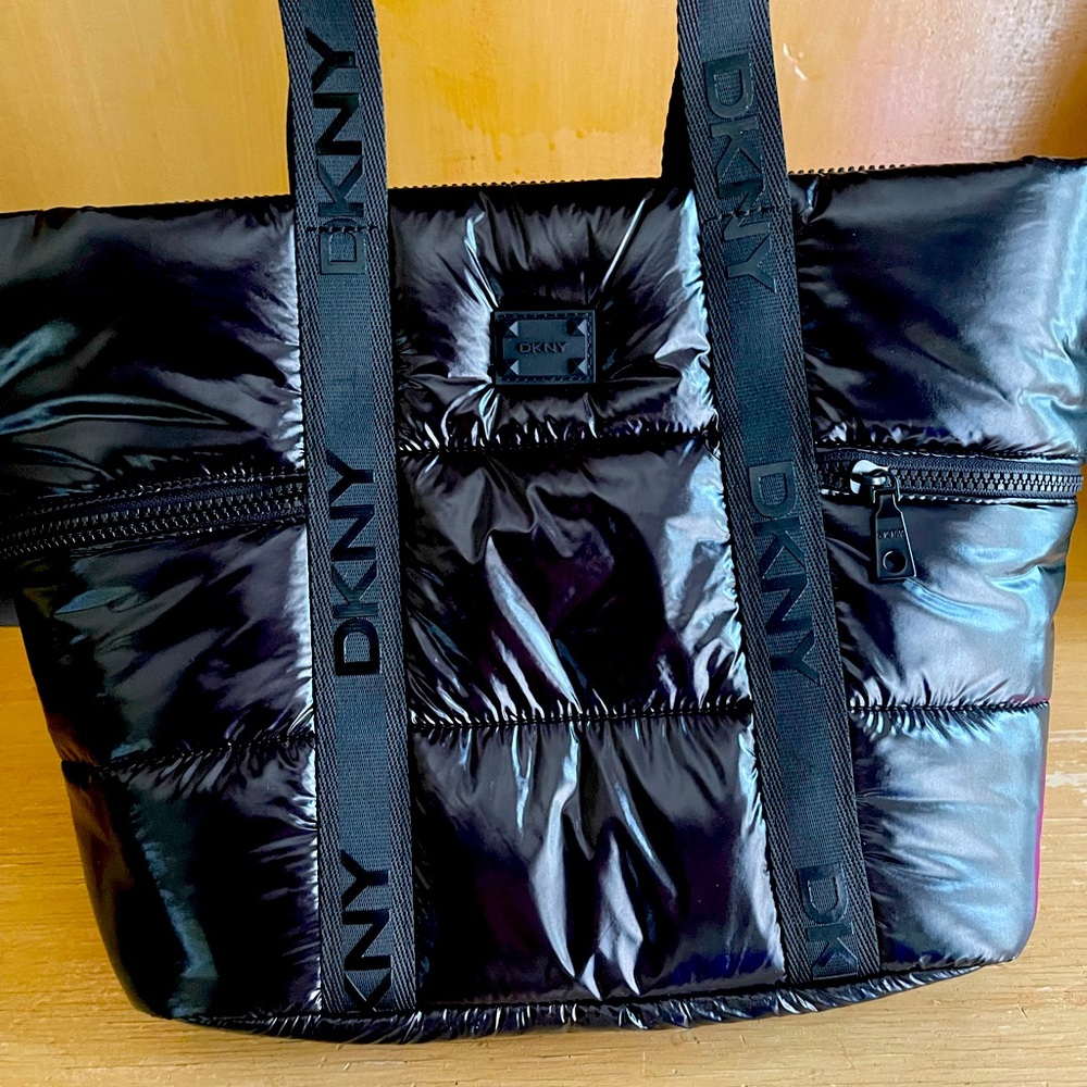 Brand new DKNY black tufted bag. Very easy to clean and nice amount of space